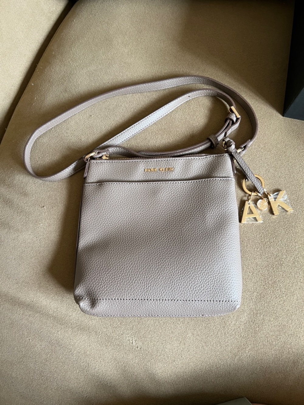 Anne Klein Pebbled Taupe Crossbody with Gold AK Charm